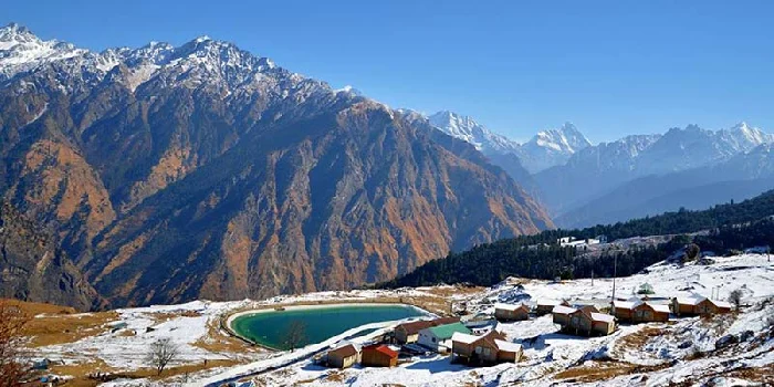 Beautiful winter landscape of Auli surrounded by snow-covered mountains